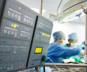 surgeons and surgical monitor