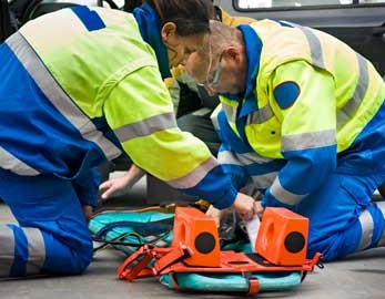 Female and male EMT's respond to an accident