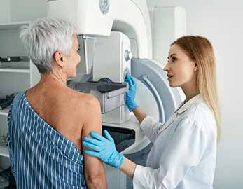mammographer and patient
